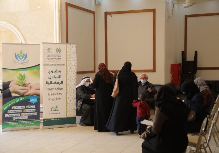 The MWL in Jordan distributes Ramadan Iftar coupons for Syrian refugees