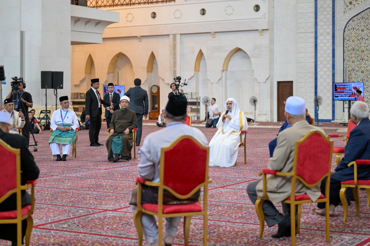 After delivering the Friday sermon and leading the prayer at the largest mosque in the Malaysian capital, Kuala Lumpur: