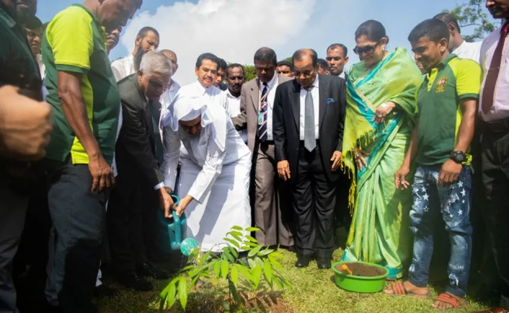  HE Dr. Mohammad Alissa participated in a tree planting while visiting Sri Lanka this summer